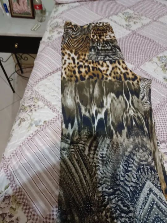 Calça Flare Animal Print núm. 40  marca Canellado - Foto 4