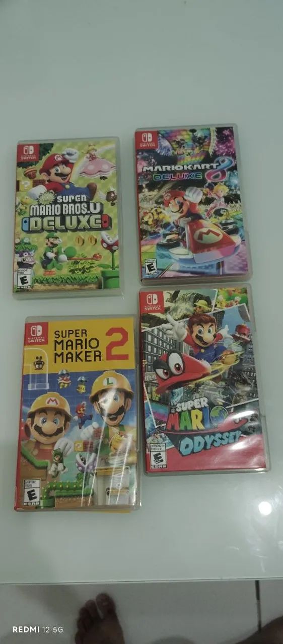 Nintendo Switch V2 com 4 cartuchos  - Foto 3