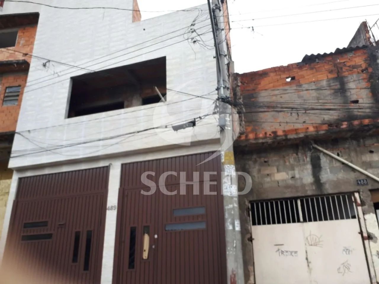 Terreno com com 4 casas e 2 salões comerciais - Foto 2