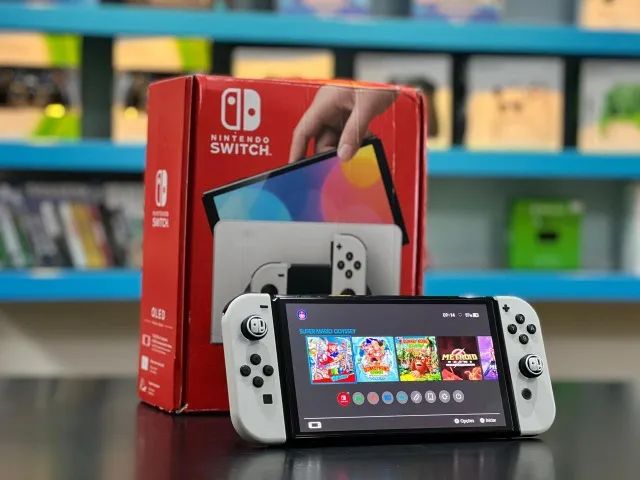 Nintendo Switch OLED SEMINOVO Desbloqueado C/ 10 Jogos - Foto 2