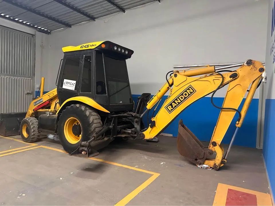 Retroescavadeira Randon RD406 4x4 2013 - Foto 2