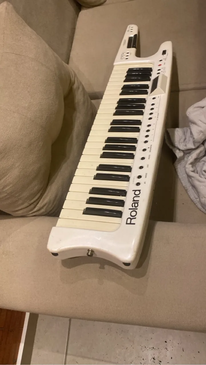 Vendo teclado Roland Ax7