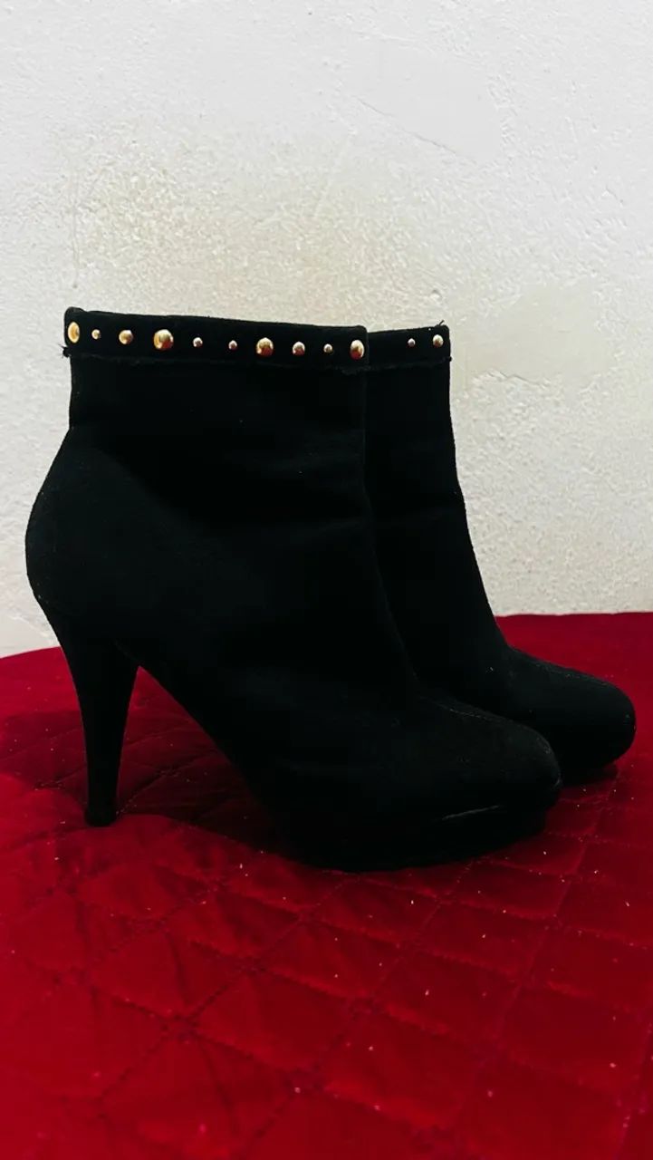 Vendo bota seminova