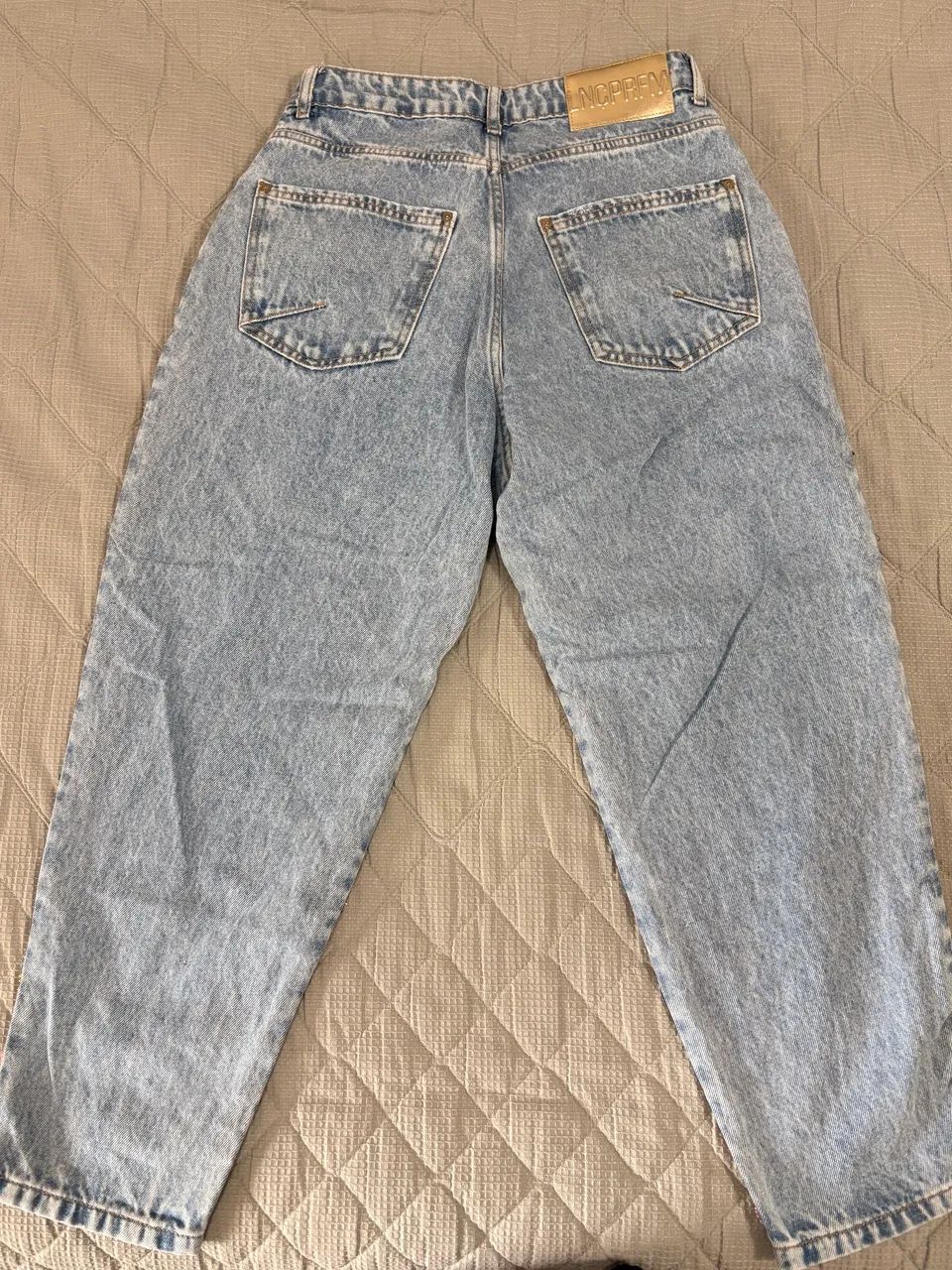 Calça lança perfume tamanho 38 - Foto 2