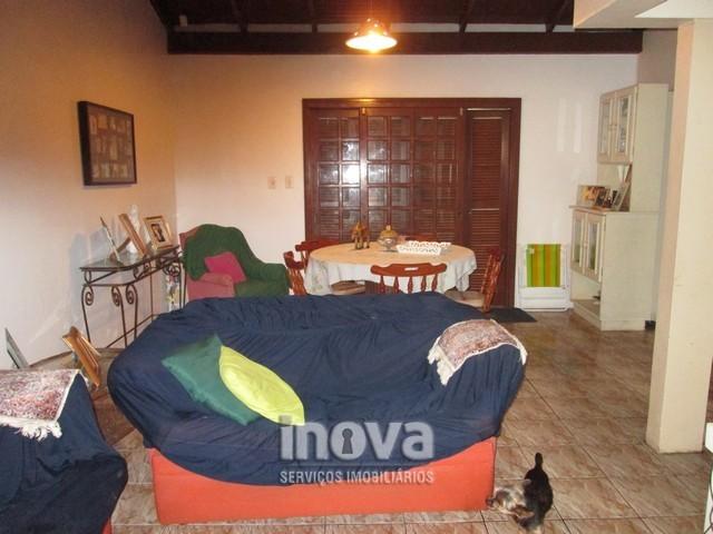 Casa de 04 dormitórios no centro de Imbé - Foto 4