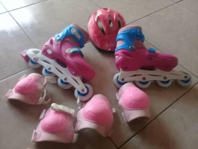 Patins com kit de proteção. R$170,00