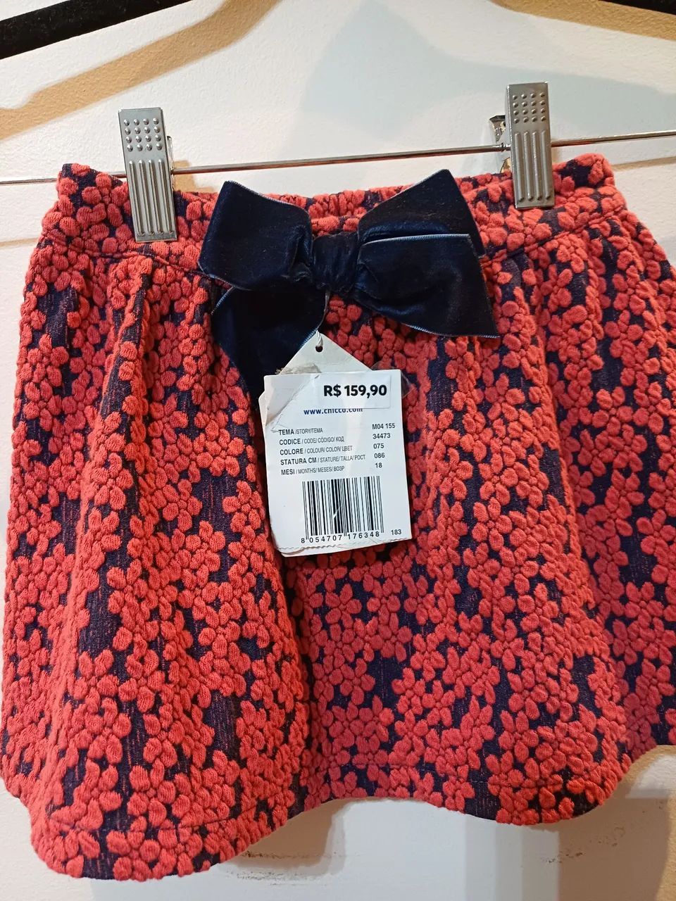 Saia Chicco vermelha nova na etiqueta,  com laço azul.
