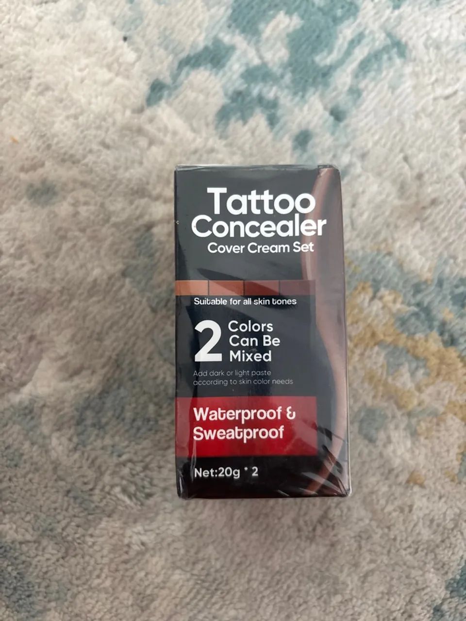 Camuflagem/maquiagem de tatuagem 