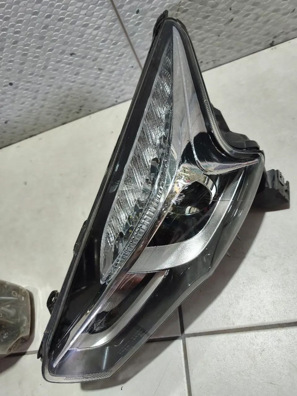 Farol esquerdo Tiggo 7 