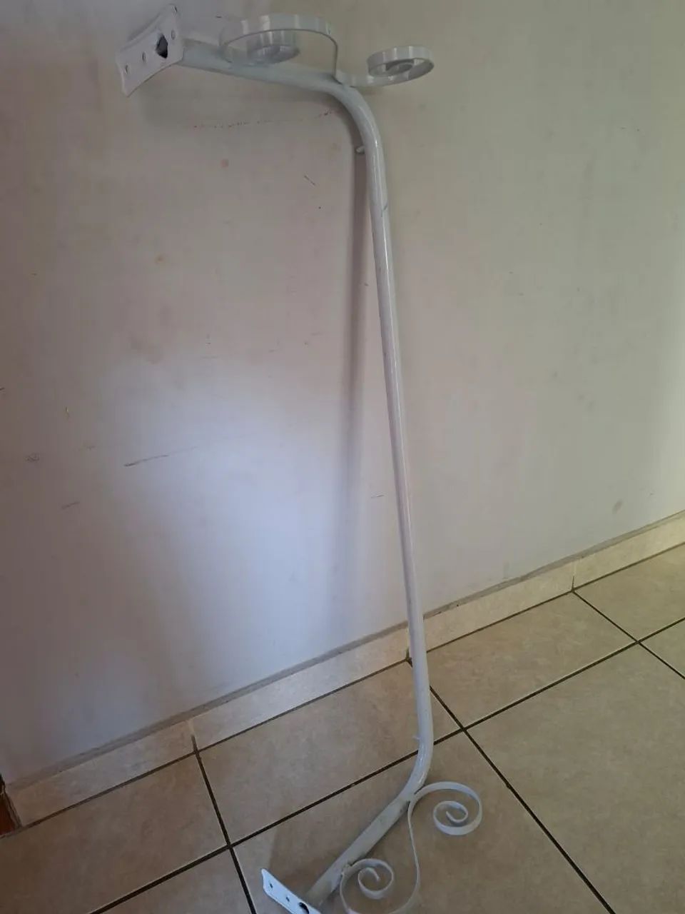 Suporte para pendurar roupas.