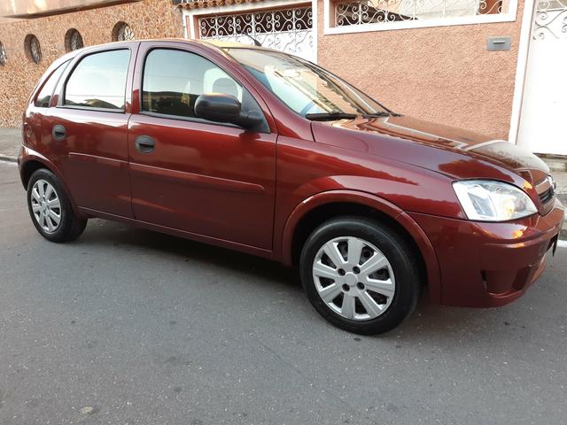 Corsa 2011 hatch 1.4 flex com gnv único dono - Foto 8