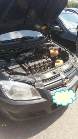 Vendo celta Preto `` aceito trocar por carro ou moto de menor valor´´