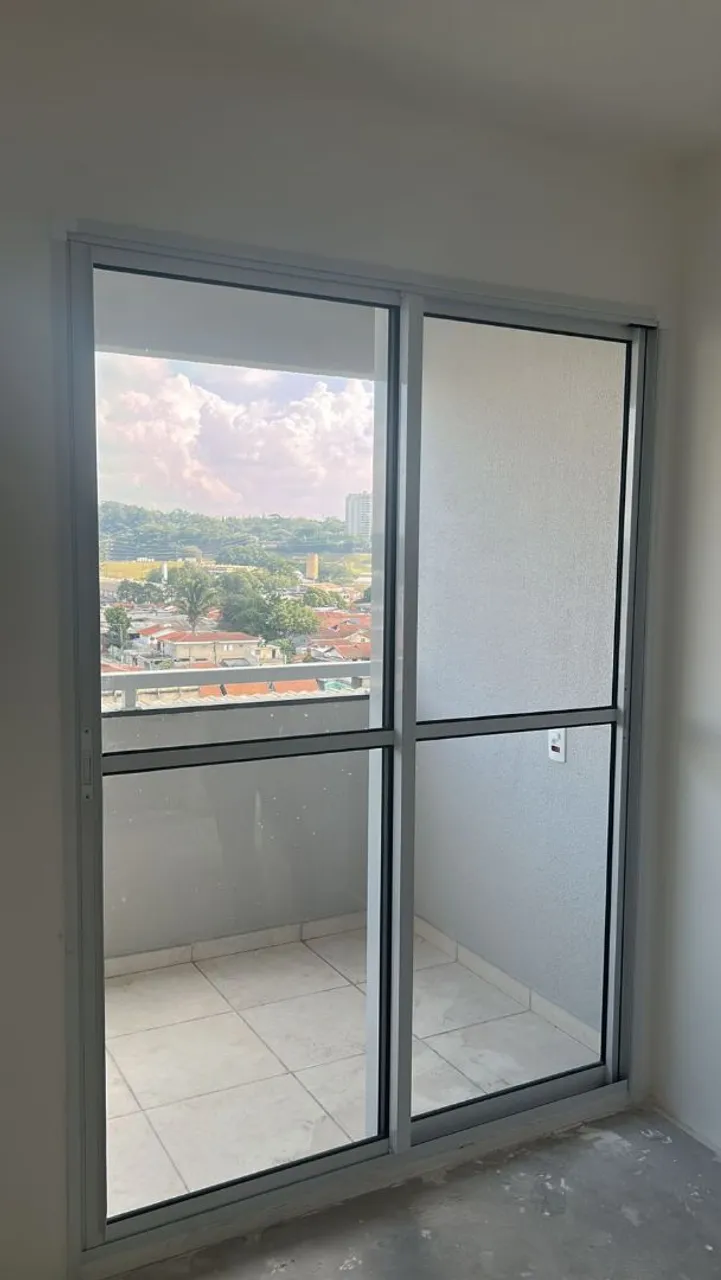 Porta balcão em alumínio branco <br>Medida 2,20x1,60<br>Estado de nova