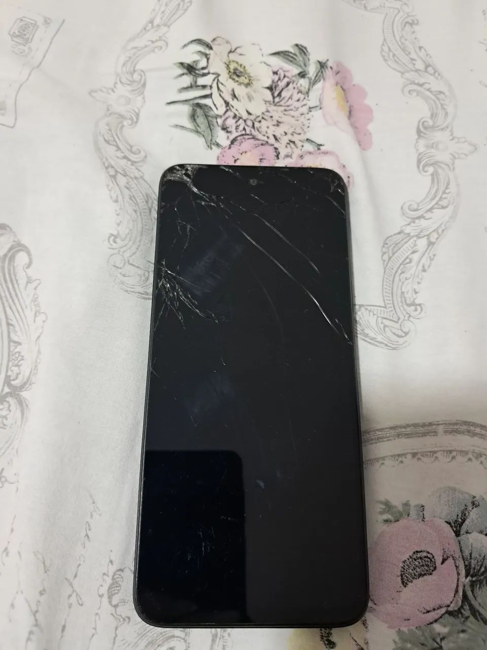 Redimi 12 tela trincada 