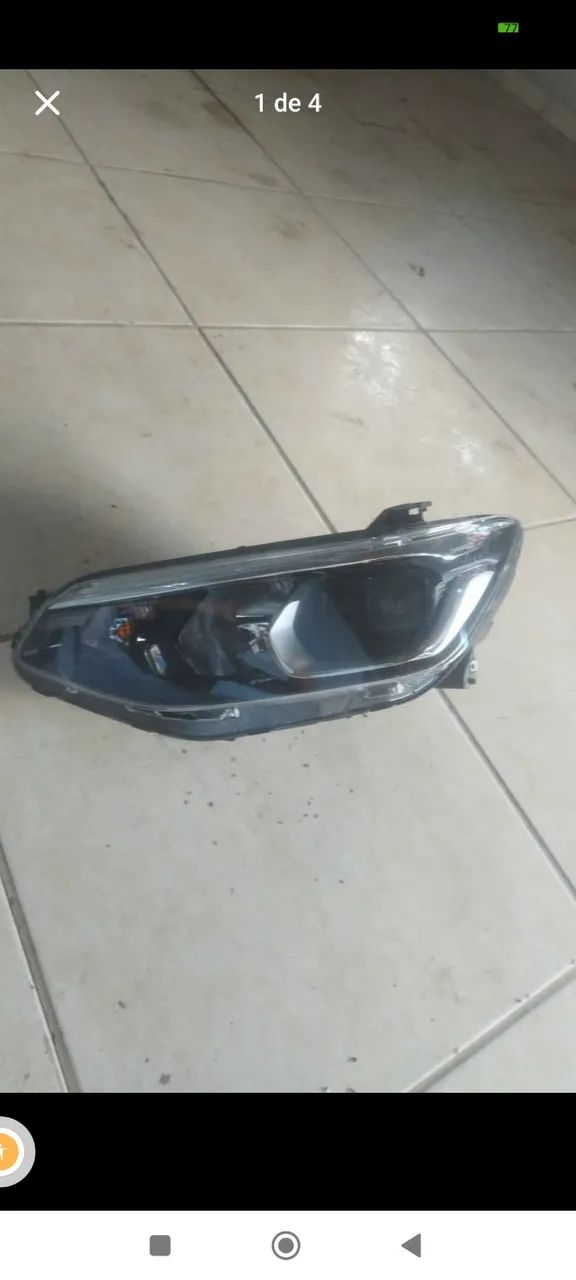 farol Tracker esquerdo 21a24 original 