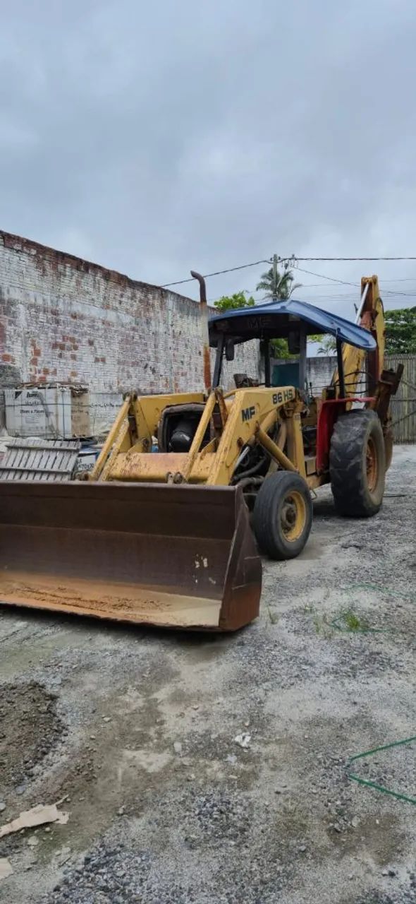 Retroescavadeira MF86