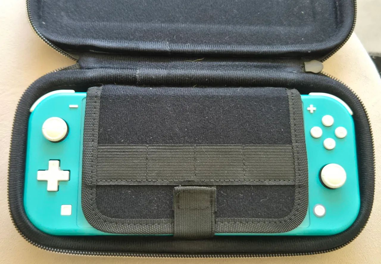 Nintendo Switch Lite, acompanha case protetora e carregador original. - Foto 5