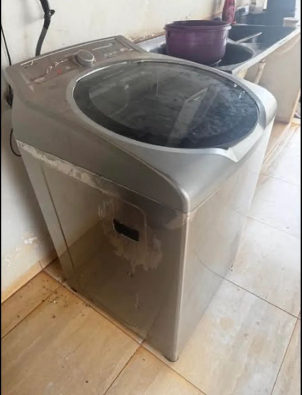 Máquina de lavar com defeito