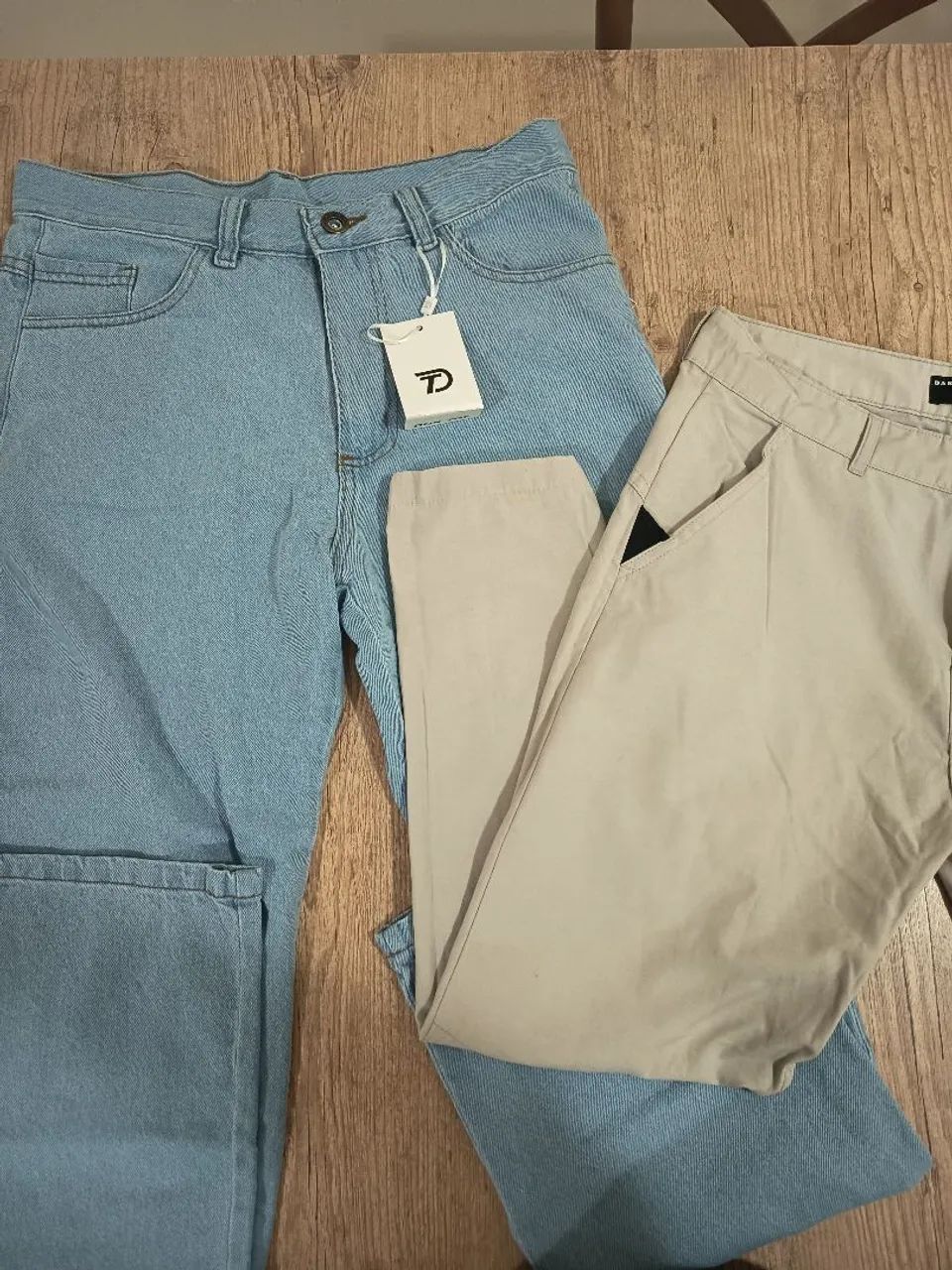02 calças masculinas das marcas Oakley e DP