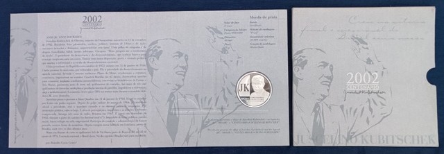 Moeda antiga de prata, no encarte oficial