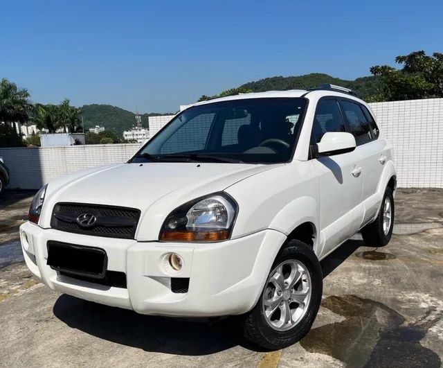 TUCSON COM BANCOS DE COURO 