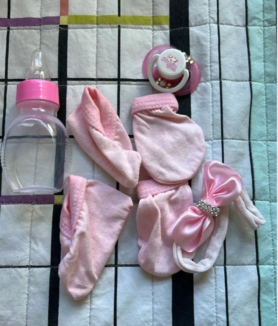 Boneca Princesa Reborn com acessórios e 5 trocas de roupa 