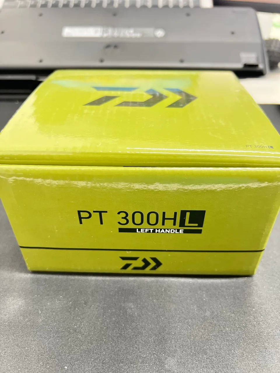 Carretilha DAIWA PT300 HL - Foto 3