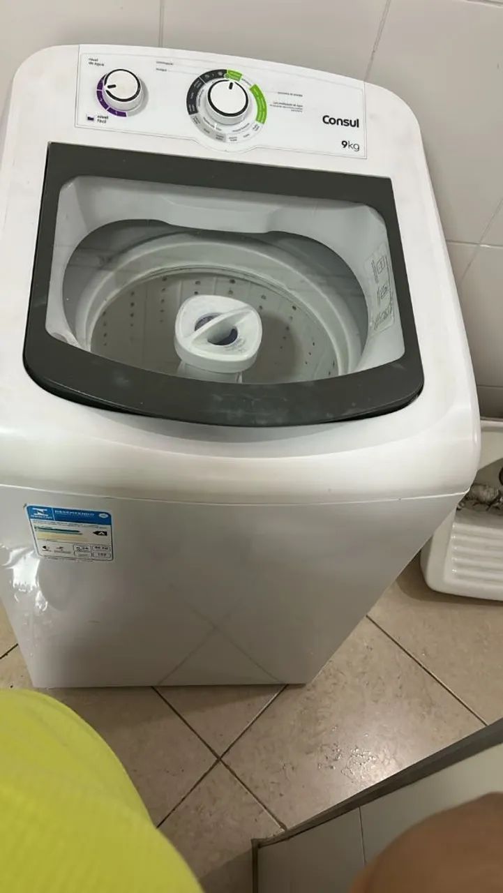 Máquina de lavar com defeito 