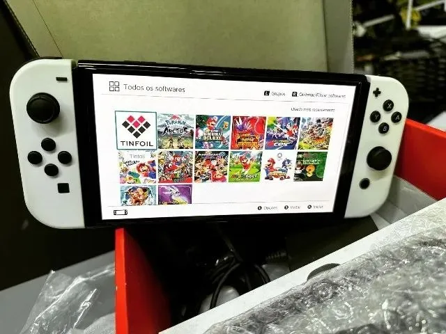 New Nintendo Switch Oled - DESTRAVADO COM 256gb 10 jogos completos e zelda  2 em portugues - Games Você Compra Venda Troca e Assistência de games em  geral