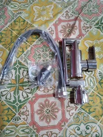 toneira com ducha nova
