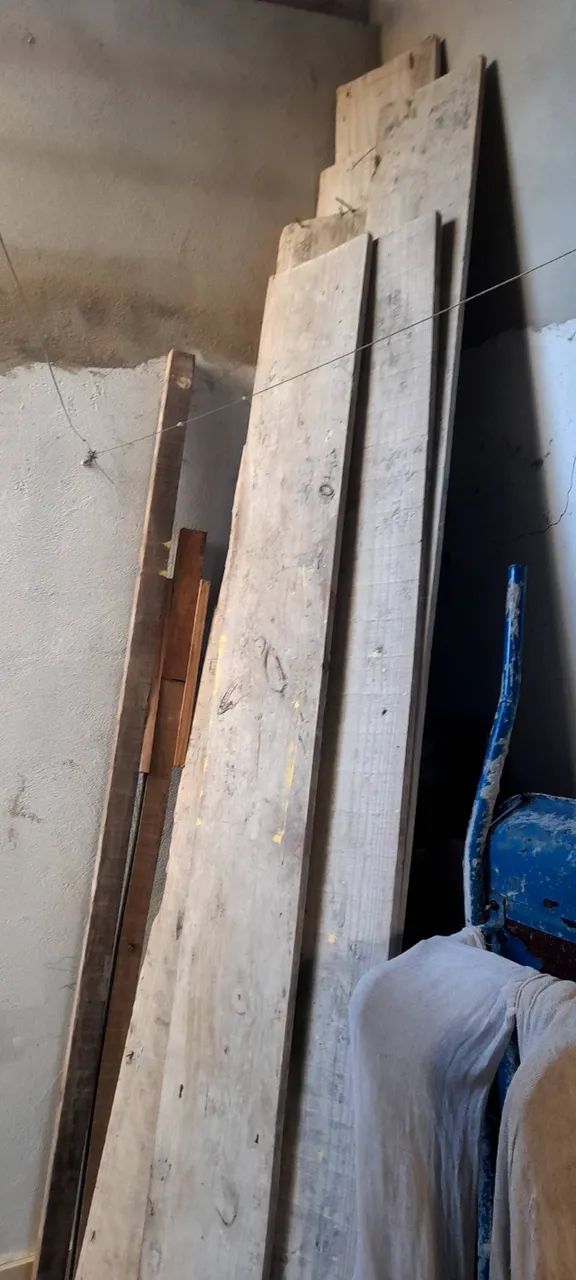Various types of lumber for construction or roofing.