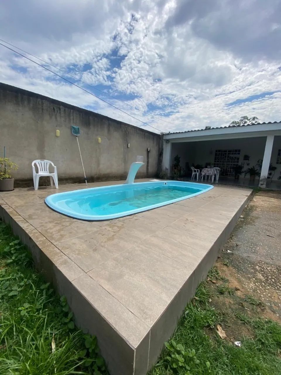 Casa com piscina, amplo espaço externo e terreno de 300 m²! - Foto 5