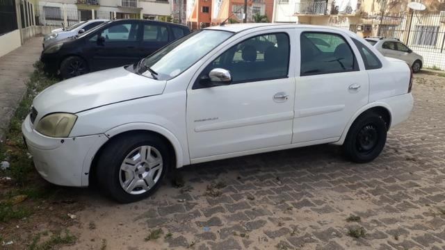 Vendo um corsa 1.4 completo valor 8800 mais 1500 de débito Detran negociavel * - Foto 3
