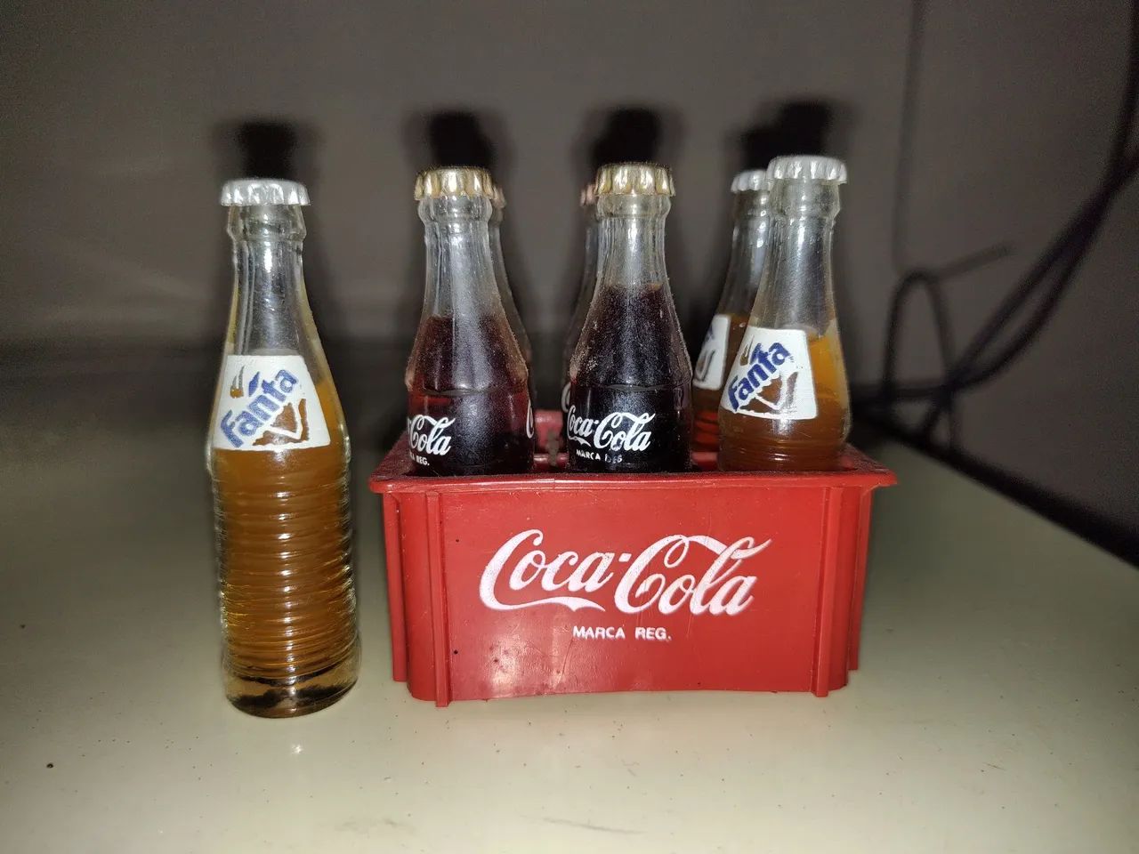 Miniaturas de Coca-Cola e Fanta e copos Pepsi e ioiô ?