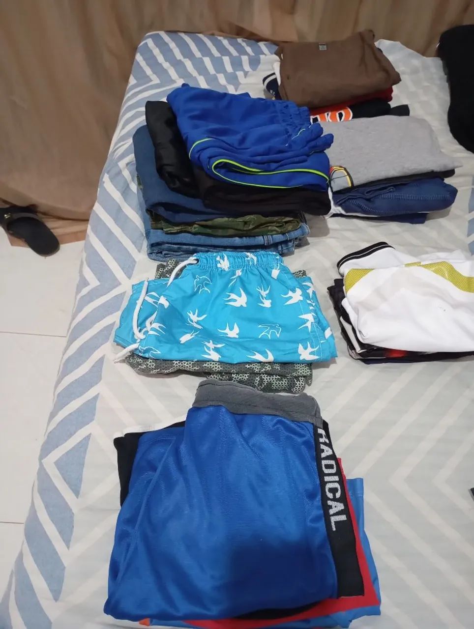 Roupas e sapato e tênis e chuteira - Foto 3