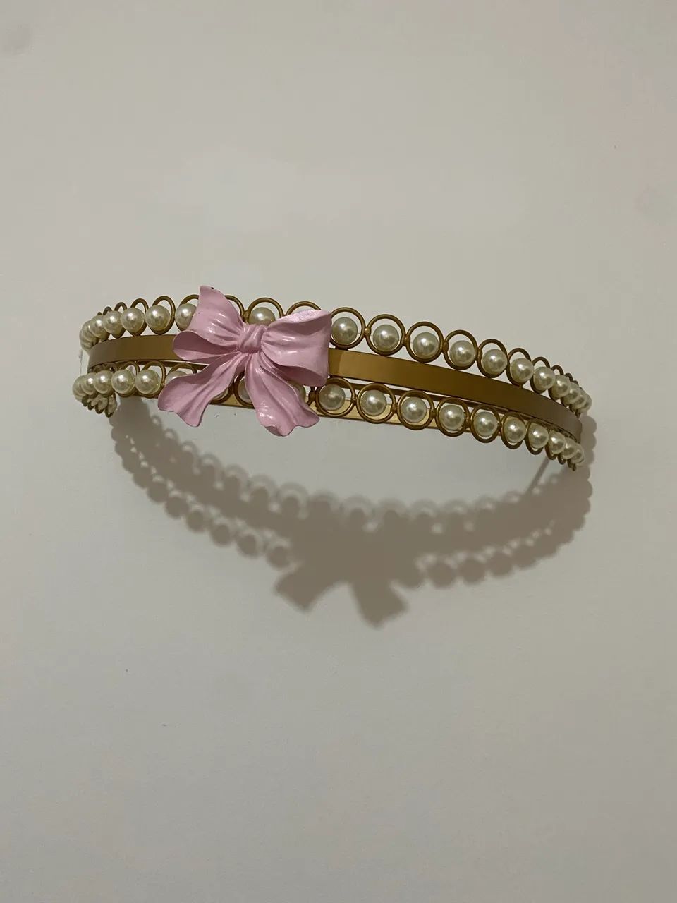 Dossel dourado de pérolas com laço  - Foto 3