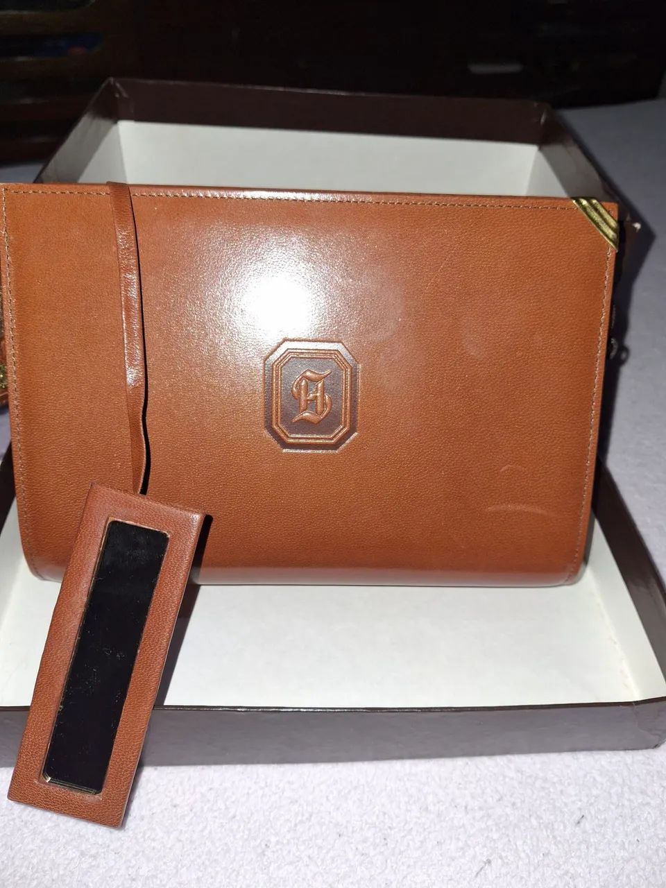 Bolsa de mao nova, original em couro H. STERN.  Vintage.