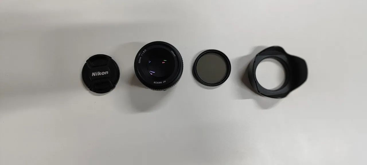 Lente Nikon 50mm F/1.8 D com acessórios  - Foto 4