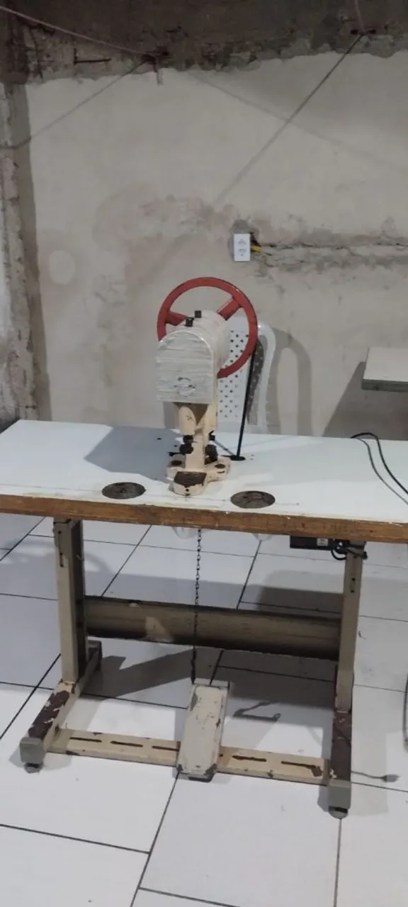 Máquina de botão