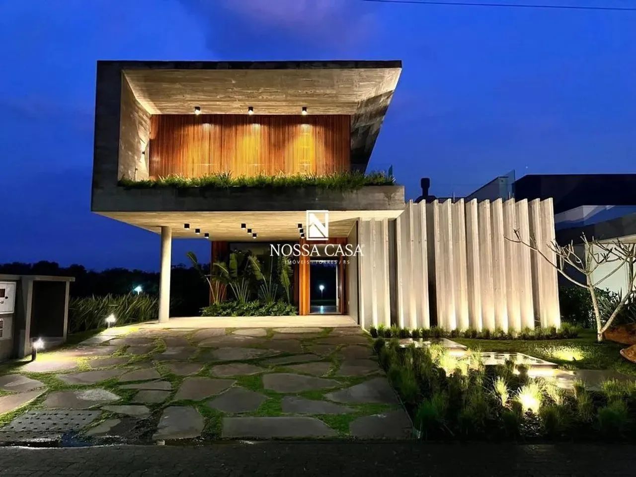 Sobrado com 4 quartos sendo todos suítes no Reserva das Águas em Torres/RS