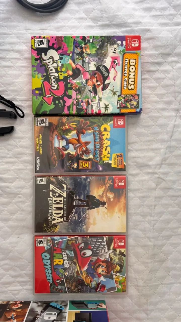 Nintendo Switch + 4 Jogos - Jogos de Vídeo Game - Setor Nintendo Switch + 4 Jogos - Jogos de Vídeo Game - Setor