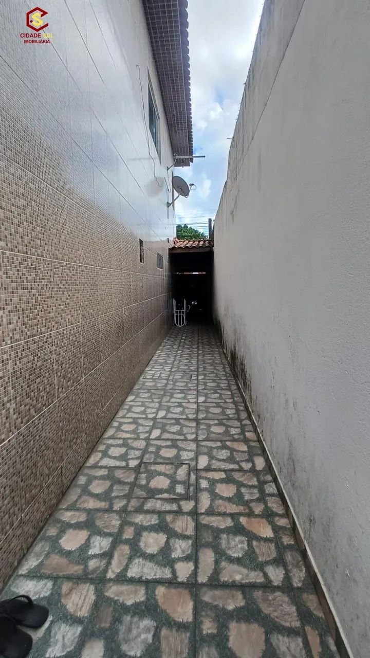 Casa com comercio á venda, térreo e primeiro andar, 2 quartos sendo uma suíte 2