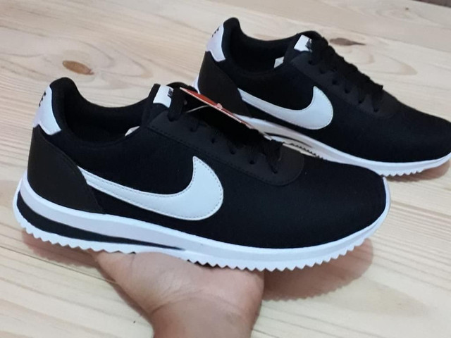 sapatos masculinos e femininos