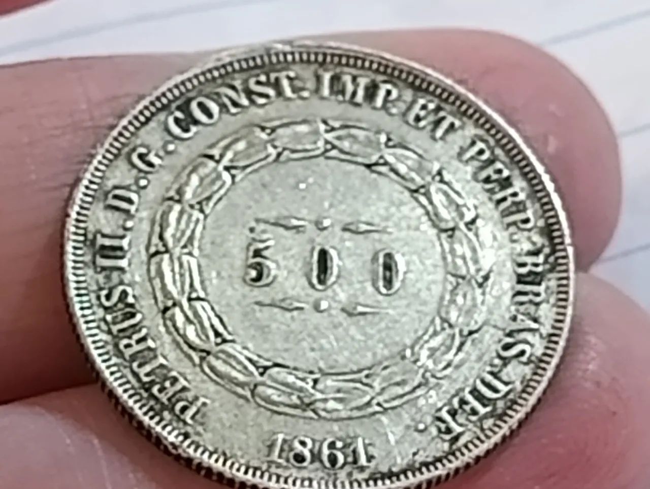 Moeda antiga em prata 