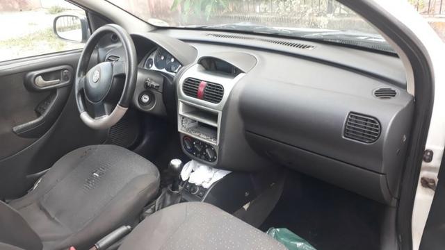 Vendo um corsa 1.4 completo valor 8800 mais 1500 de débito Detran negociavel * - Foto 5