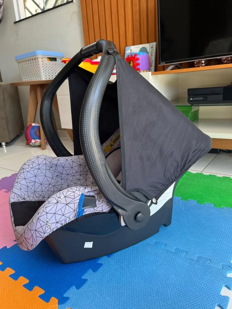 Bebê conforto com design moderno e seguro