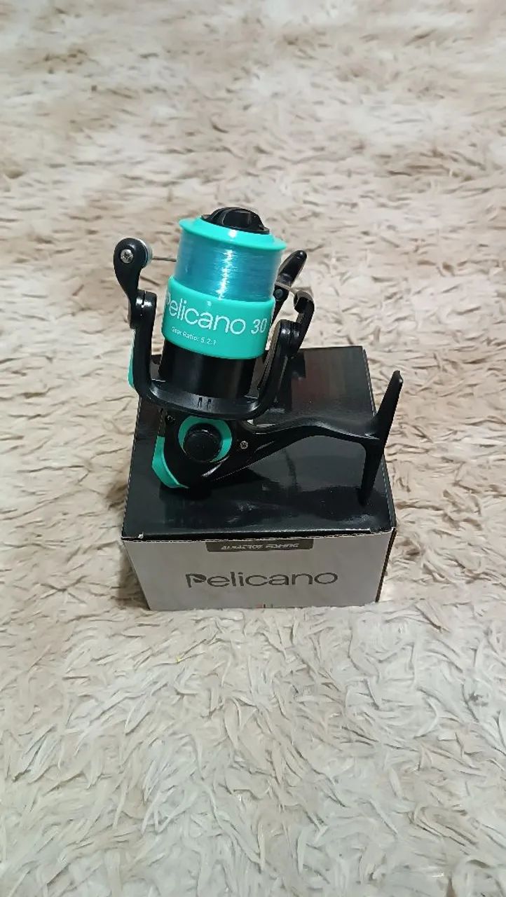 Molinete pelicano 3000 novo - Foto 5