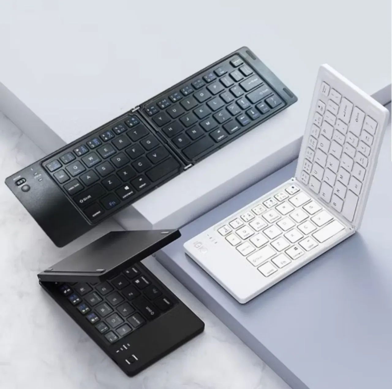 Mini Teclado Dobrável Bluetooth Para Celular e Tablet Portabilidade e Produtividade 