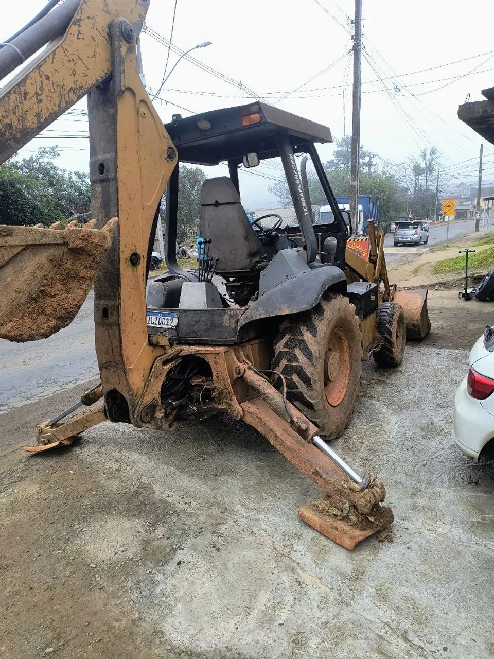 Retroescavadeira Case 580l