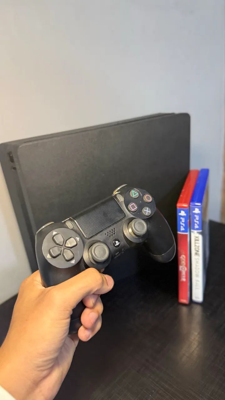 PS4 Slim - 1TB + 2 Jogos  - Foto 2